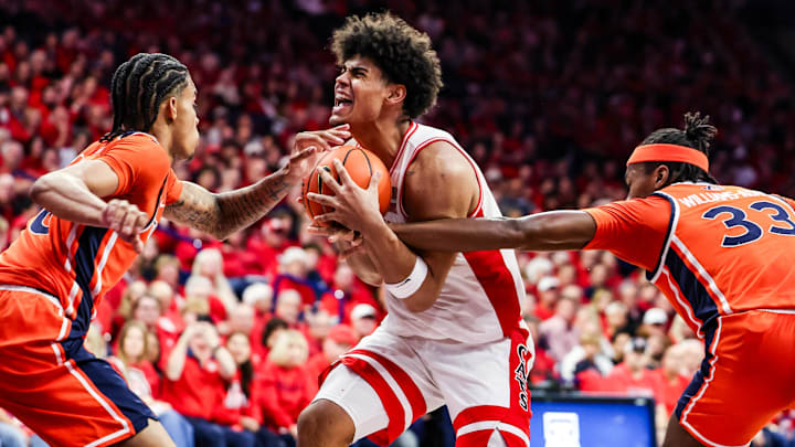 Dec 6, 2025; Tucson, Arizona, USA; Auburn Tigers forward Sebastian Williams-Adams (33) fouls Arizona Wildcats forward Koa Peat (10) during the second half of the game at McKale Memorial Center. Mandatory Credit: Aryanna Frank-Imagn Images Dec 6, 2025; Tucson, Arizona, USA; Auburn Tigers forward Sebastian Williams-Adams (33) fouls Arizona Wildcats forward Koa Peat (10) during the second half of the game at McKale Memorial Center. Mandatory Credit: Aryanna Frank-Imagn Images