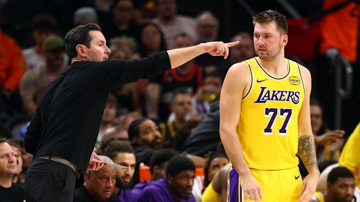 Oct 14, 2025; Phoenix, Arizona, USA; Los Angeles Lakers guard Luka Doncic (77) with head coach JJ Redick against the Phoenix Suns during an NBA preseason game at Mortgage Matchup Center. Mandatory Credit: Mark J. Rebilas-Imagn Images
Oct 14, 2025; Phoenix, Arizona, USA; Los Angeles Lakers guard Luka Doncic (77) with head coach JJ Redick against the Phoenix Suns during an NBA preseason game at Mortgage Matchup Center. Mandatory Credit: Mark J. Rebilas-Imagn Images