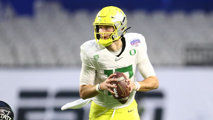 Jan 2, 2021; Glendale, AZ, USA; Oregon Ducks quarterback Tyler Shough (12) against the Iowa State Cyclones in the Fiesta Bowl at State Farm Stadium. Mandatory Credit: Mark J. Rebilas-Imagn Images