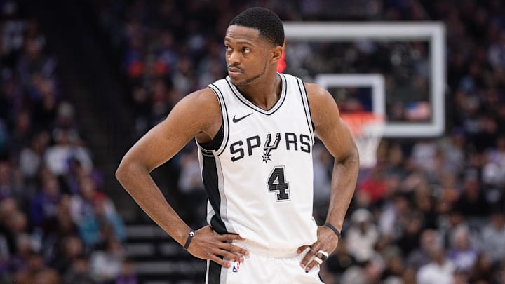 Mar 7, 2025; Sacramento, California, USA; San Antonio Spurs guard De'Aaron Fox (4) looks on during the first quarter of the game against the Sacramento Kings at Golden 1 Center.
