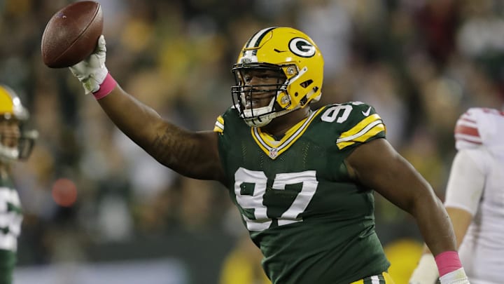 Green Bay Packers defender Kenny Clark celebrates after recovering a fumble by the New York Giants at Lambeau Field 
