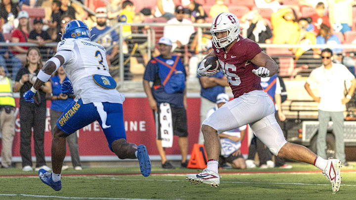 Sep 27, 2025; Stanford, California, USA;  Stanford Cardinal tight end Sam Roush (86) runs for a touchdown during the second quarter against San Jose State Spartans safety Larry Turner-Gooden (3) at Stanford Stadium. Mandatory Credit: Stan Szeto-Imagn Images

