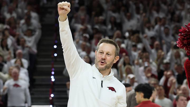 Arkansas Razorbacks coach coach Ryan Silverfield calls the hogs during a timeout during a basketball game. Arkansas Razorbacks coach coach Ryan Silverfield calls the hogs during a timeout during a basketball game.