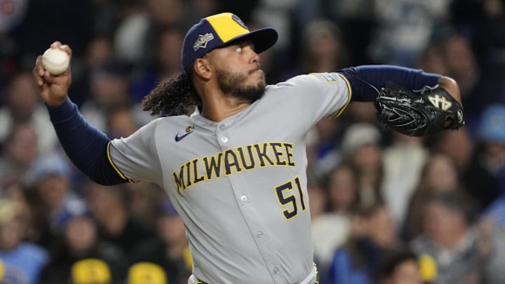 Oct 9, 2025; Chicago, Illinois, USA; Milwaukee Brewers pitcher Freddy Peralta (51) throws pitch against the Chicago Cubs during the first inning for game four of the NLDS round for the 2025 MLB playoffs at Wrigley Field. Mandatory Credit: David Banks-Imagn Images