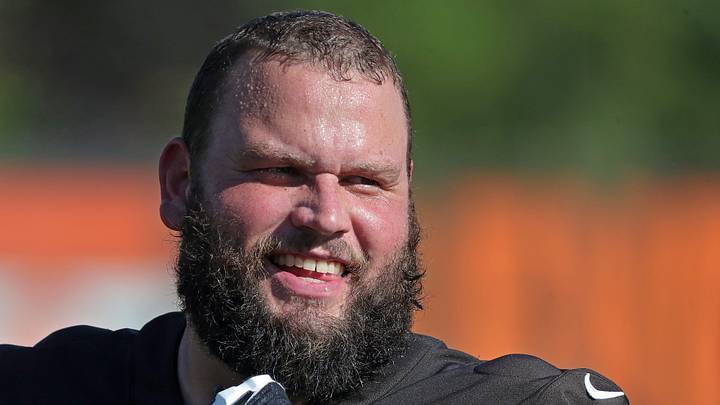 Browns guard Joel Bitonio heads in after practice July 23, 2025.