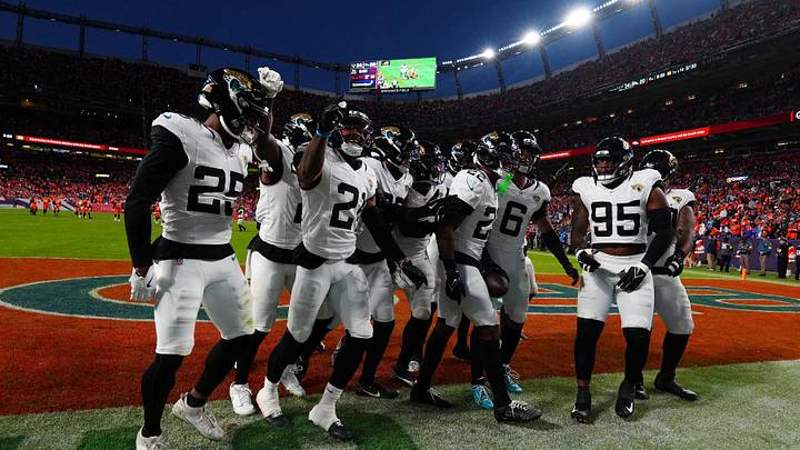 Dec 21, 2025; Denver, Colorado, USA; The Jacksonville Jaguars defense reacts during the second half at Empower Field at Mile High. Mandatory Credit: Ron Chenoy-Imagn Images Dec 21, 2025; Denver, Colorado, USA; The Jacksonville Jaguars defense reacts during the second half at Empower Field at Mile High. Mandatory Credit: Ron Chenoy-Imagn Images
