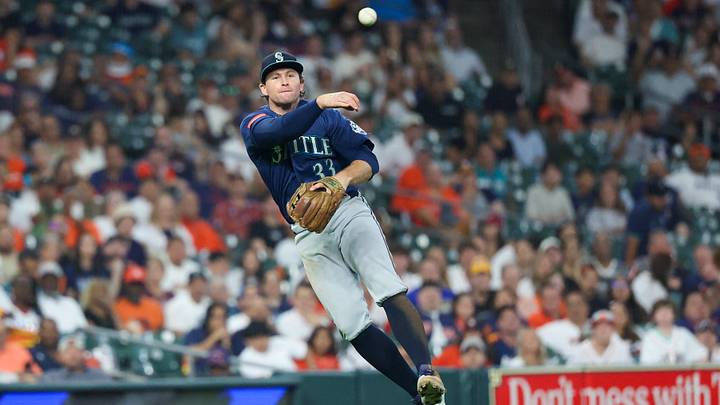 Aug 16, 2026; Houston, Texas, USA; Seattle Mariners third baseman Brendan Donovan (33) throws out Houston Astros catcher Yainer Diaz (not pictured) at first base in the fifth inning at Daikin Park. Mandatory Credit: Thomas Shea-Imagn Images
