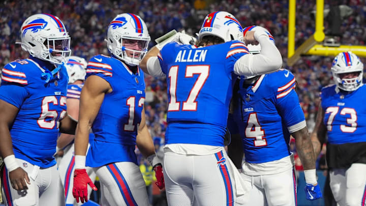Nov 17, 2024; Orchard Park, New York, USA; Buffalo Bills quarterback Josh Allen (17) congratulates Buffalo Bills running back James Cook (4) for scoring a touchdown against the Kansas City Chiefs during the first half at Highmark Stadium