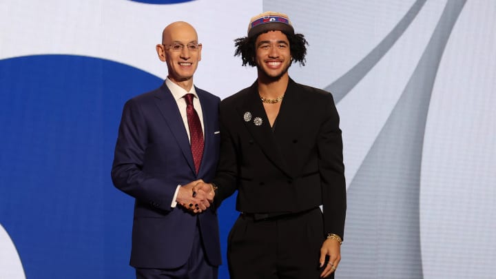 Jun 26, 2024; Brooklyn, NY, USA; Jared McCain poses for photos with NBA commissioner Adam Silver after being selected in the first round by the Philadelphia 76ers in the 2024 NBA Draft at Barclays Center. Mandatory Credit: Brad Penner-USA TODAY Sports Jun 26, 2024; Brooklyn, NY, USA; Jared McCain poses for photos with NBA commissioner Adam Silver after being selected in the first round by the Philadelphia 76ers in the 2024 NBA Draft at Barclays Center. Mandatory Credit: Brad Penner-USA TODAY Sports