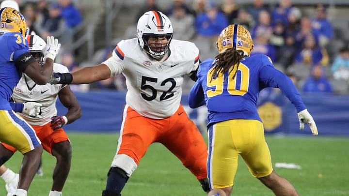 Nov 9, 2024; Pittsburgh, Pennsylvania, USA; Virginia Cavaliers offensive lineman McKale Boley (52) blocks at the line of scrimmage against the Pittsburgh Panthers during the third quarter at Acrisure Stadium. Mandatory Credit: Charles LeClaire-Imagn Images Nov 9, 2024; Pittsburgh, Pennsylvania, USA; Virginia Cavaliers offensive lineman McKale Boley (52) blocks at the line of scrimmage against the Pittsburgh Panthers during the third quarter at Acrisure Stadium. Mandatory Credit: Charles LeClaire-Imagn Images