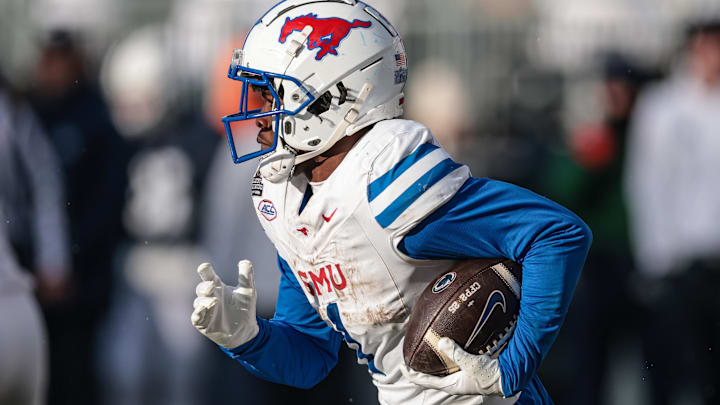 Dec 21, 2024; University Park, Pennsylvania, USA; Southern Methodist Mustangs running back Brashard Smith (1) carries the ball during the second half against the Penn State Nittany Lions at Beaver Stadium. Mandatory Credit: Vincent Carchietta-Imagn Images Dec 21, 2024; University Park, Pennsylvania, USA; Southern Methodist Mustangs running back Brashard Smith (1) carries the ball during the second half against the Penn State Nittany Lions at Beaver Stadium. Mandatory Credit: Vincent Carchietta-Imagn Images