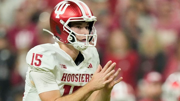 Indiana Hoosiers quarterback Fernando Mendoza (15) prepares to snap the play Saturday, Dec. 6, 2025, during the Big Ten football championship against the Ohio State Buckeyes at Lucas Oil Stadium in Indianapolis. Indiana Hoosiers quarterback Fernando Mendoza (15) prepares to snap the play Saturday, Dec. 6, 2025, during the Big Ten football championship against the Ohio State Buckeyes at Lucas Oil Stadium in Indianapolis.