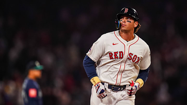 Apr 22, 2025; Boston, Massachusetts, USA; Boston Red Sox first base Triston Casas (36) hits a three run home run against the Seattle Mariners in the seventh inning at Fenway Park. Mandatory Credit: David Butler II-Imagn Images