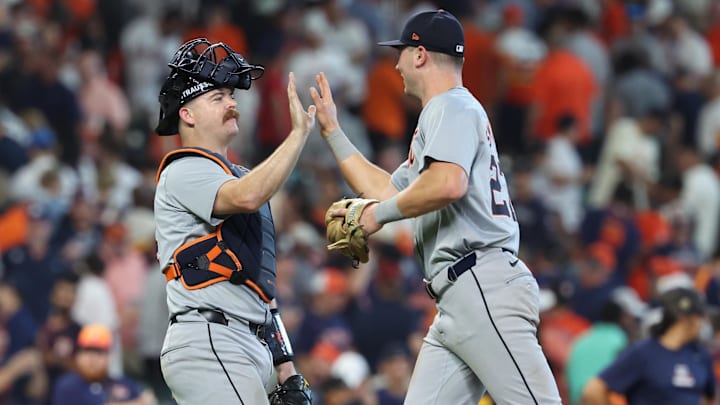 Oct 1, 2024; Houston, Texas, USA; Detroit Tigers catcher Jake Rogers (34) and Detroit Tigers shortstop Trey Sweeney (27) celebrate defeating the Houston Astros in game one of the Wild Card round for the 2024 MLB Playoffs at Minute Maid Park.