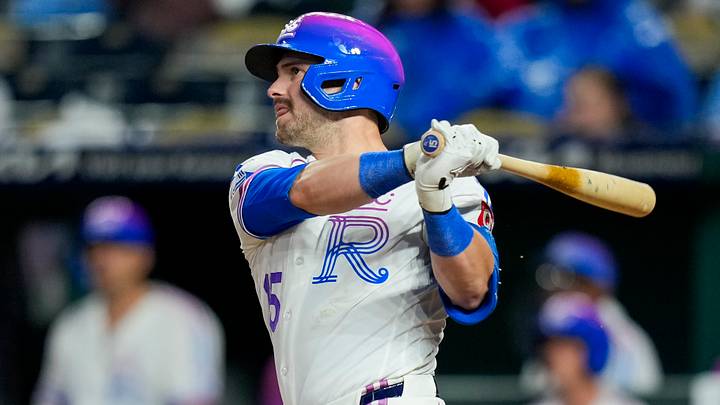 Apr 26, 2026; Kansas City, Missouri, USA; Kansas City Royals center fielder Lane Thomas (15) hits a walk-off home run during the tenth inning against the Los Angeles Angels at Kauffman Stadium. Mandatory Credit: Jay Biggerstaff-Imagn Images