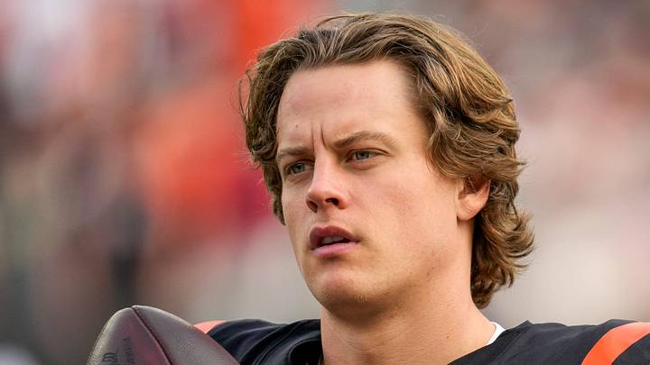 Cincinnati Bengals quarterback Joe Burrow (9) gets loose before the start of the first quarter of the NFL Week 17 game between the Cincinnati Bengals and the Arizona Cardinals at Paycor Stadium in Downtown Cincinnati on Sunday, Dec. 28, 2025. The Bengals led 23-7 at halftime.
