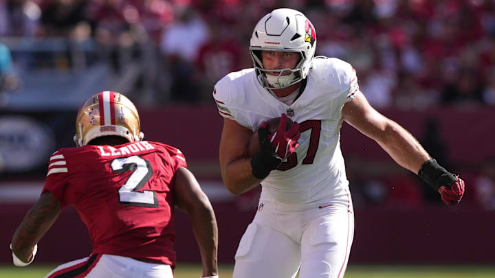 Oct 6, 2024; Santa Clara, California, USA; Arizona Cardinals tight end Tip Reiman (right) runs after a catch against San Francisco 49ers cornerback Deommodore Lenoir (2) during the fourth quarter at Levi's Stadium. Mandatory Credit: Darren Yamashita-Imagn Images Oct 6, 2024; Santa Clara, California, USA; Arizona Cardinals tight end Tip Reiman (right) runs after a catch against San Francisco 49ers cornerback Deommodore Lenoir (2) during the fourth quarter at Levi's Stadium. Mandatory Credit: Darren Yamashita-Imagn Images