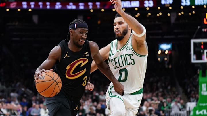 May 9, 2024; Boston, Massachusetts, USA; Cleveland Cavaliers guard Caris LeVert (3) drives the ball against Boston Celtics forward Jayson Tatum (0) in the second quarter during game two of the second round for the 2024 NBA playoffs at TD Garden. Mandatory Credit: David Butler II-Imagn Images