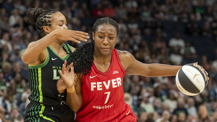 Jul 1, 2025; Minneapolis, Minnesota, USA; Indiana Fever forward Aliyah Boston (7) dribbles the ball past Minnesota Lynx forward Napheesa Collier (24) in the first half during the Commissioner's Cup final at Target Center. Mandatory Credit: Jesse Johnson-Imagn Images Jul 1, 2025; Minneapolis, Minnesota, USA; Indiana Fever forward Aliyah Boston (7) dribbles the ball past Minnesota Lynx forward Napheesa Collier (24) in the first half during the Commissioner's Cup final at Target Center. Mandatory Credit: Jesse Johnson-Imagn Images