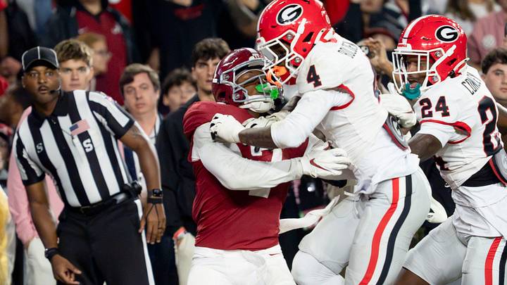 Oct 10, 2026; Tuscaloosa, Alabama, USA; Georgia defensive back KJ Bolden (4) hits Alabama wide receiver Rico Scott (7) well before the ball arrives at Saban Field at Bryant-Denny Stadium. No penalty was called. Mandatory Credit: Gary Cosby Jr.-Imagn Images Oct 10, 2026; Tuscaloosa, Alabama, USA; Georgia defensive back KJ Bolden (4) hits Alabama wide receiver Rico Scott (7) well before the ball arrives at Saban Field at Bryant-Denny Stadium. No penalty was called. Mandatory Credit: Gary Cosby Jr.-Imagn Images
