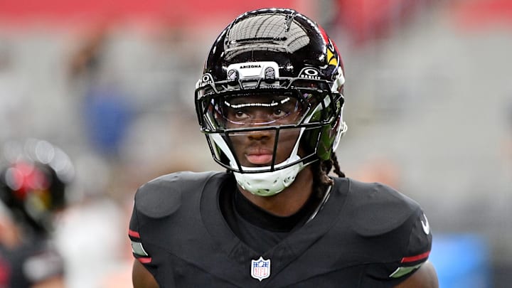 Oct 5, 2025; Glendale, Arizona, USA; Arizona Cardinals wide receiver Marvin Harrison Jr. (18) warms up before their game against the Tennessee Titans at State Farm Stadium. Mandatory Credit: Matt Kartozian-Imagn Images