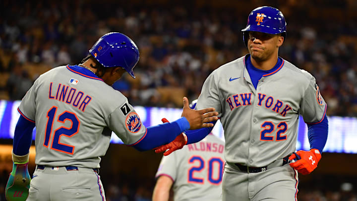 Jun 3, 2025; Los Angeles, California, USA; New York Mets outfielder Juan Soto (22) reacts with shortstop Francisco Lindor (12) after hitting a two run home run against the Los Angeles Dodgers during the third inning at Dodger Stadium. Mandatory Credit: Gary A. Vasquez-Imagn Images
