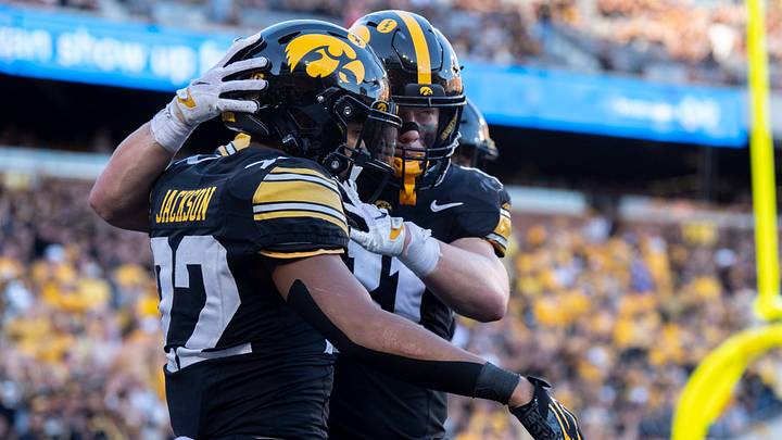 Iowa Hawkeyes running back Braeden Jackson (22) celebrates with teammate DJ Vonnahme (81) after scoring a touchdown during a Big Ten college football game against the Ohio State Buckeyes Oct. 3, 2026 at Kinnick Stadium in Iowa City, Iowa.