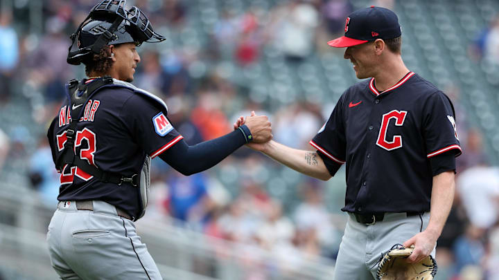Sep 20, 2025: Cleveland Guardians pitcher Kolby Allard (49) and catcher Bo Naylor (23) celebrates their teams win against the Minnesota Twins during the ninth inning of game one of a double header at Target Field. 