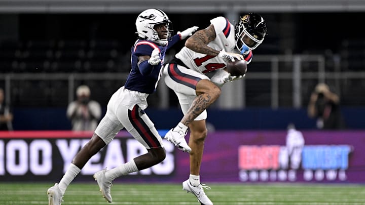 Jan 30, 2025; Arlington, TX, USA; West wide receiver Will Sheppard of Colorado (14) catches a pass in front of East defensive back Zah Frazier of UTSA (0) during the first half at AT&T Stadium. Mandatory Credit: Jerome Miron-Imagn Images Jan 30, 2025; Arlington, TX, USA; West wide receiver Will Sheppard of Colorado (14) catches a pass in front of East defensive back Zah Frazier of UTSA (0) during the first half at AT&T Stadium. Mandatory Credit: Jerome Miron-Imagn Images