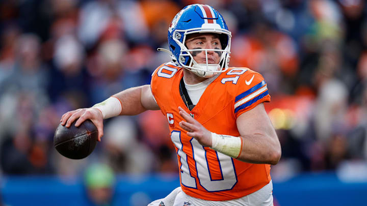 Jan 5, 2025; Denver, Colorado, USA; Denver Broncos quarterback Bo Nix (10) looks to pass in the third quarter against the Kansas City Chiefs at Empower Field at Mile High. Mandatory Credit: Isaiah J. Downing-Imagn Images