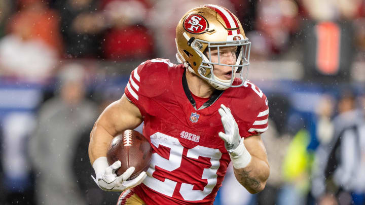 January 20, 2024; Santa Clara, CA, USA; San Francisco 49ers running back Christian McCaffrey (23) runs the ball against the Green Bay Packers during the first quarter in a 2024 NFC divisional round game at Levi's Stadium. Mandatory Credit: Kyle Terada-USA TODAY Sports