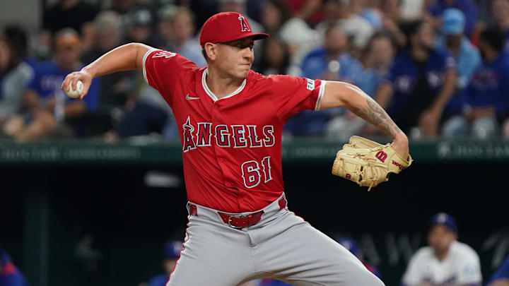 Apr 16, 2025; Arlington, Texas, USA; Los Angeles Angels relief pitcher Michael Darrell-Hicks (61) throws to the plate during the eighth inning against the Texas Rangers at Globe Life Field. Mandatory Credit: Raymond Carlin III-Imagn Images