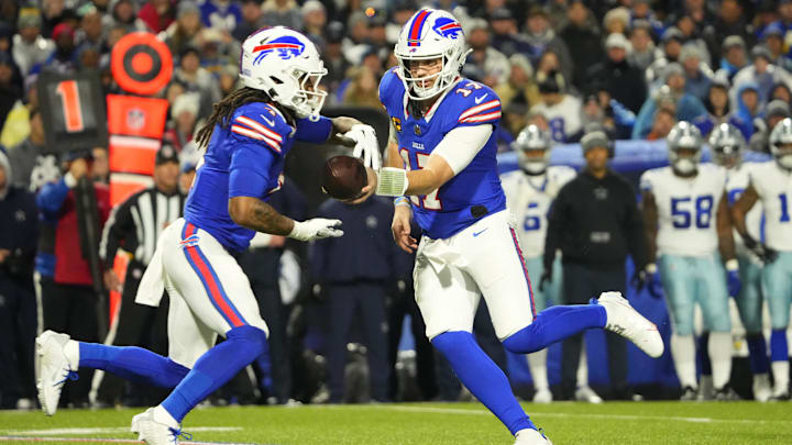 Dec 17, 2023; Orchard Park, New York, USA; Buffalo Bills quarterback Josh Allen (17) handles the