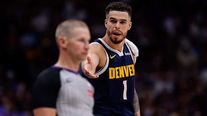 May 11, 2025; Denver, Colorado, USA; Denver Nuggets forward Michael Porter Jr. (1) gestures to referee Tyler Ford in the second quarter against the Oklahoma City Thunder during game four of the second round of the 2025 NBA Playoffs at Ball Arena. Mandatory Credit: Isaiah J. Downing-Imagn Images