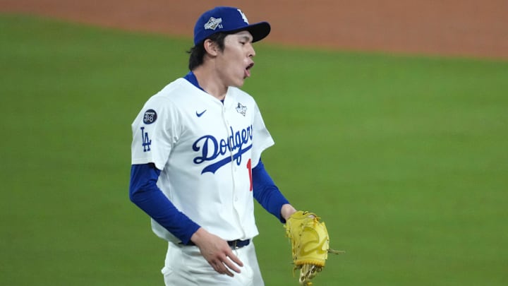 Oct 27, 2025; Los Angeles, California, USA; Los Angeles Dodgers pitcher Roki Sasaki (11) reacts in the eighth inning against the Toronto Blue Jays during game three of the 2025 MLB World Series at Dodger Stadium. Mandatory Credit: Kirby Lee-Imagn Images
