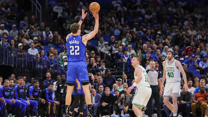 Orlando Magic forward Franz Wagner (22) shoots a three-point basket during the second quarter against the Boston Celtics at Kia Center.