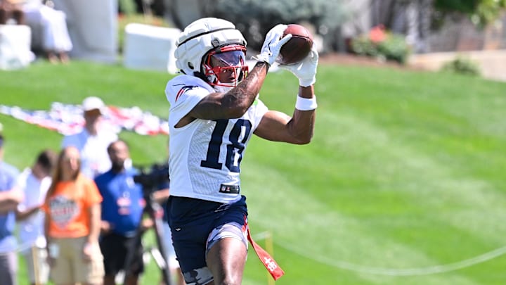 Jul 23, 2025; Foxborough, MA, USA; New England Patriots wide receiver Kyle Williams (18) makes a catch during training camp at Gillette Stadium. Mandatory Credit: Eric Canha-Imagn Images