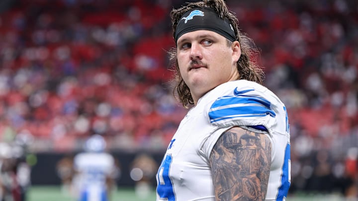 Detroit Lions guard Tate Ratledge (69) after an injury to safety Morice Norris (not pictured) against the Atlanta Falcons in the fourth quarter at Mercedes-Benz Stadium. 