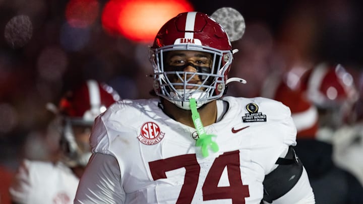 Dec 19, 2025; Norman, OK, USA; Alabama Crimson Tide offensive lineman Kadyn Proctor (74) against the Oklahoma Sooners during the CFP National Playoff First Round at Gaylord Family Oklahoma Memorial Stadium. Mandatory Credit: Mark J. Rebilas-Imagn Images