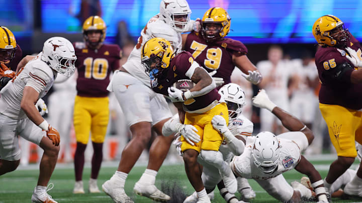 Jan 1, 2025; Atlanta, GA, USA; Arizona State Sun Devils running back Kyson Brown (2) runs with the ball against the Texas Longhorns during the second half of the Peach Bowl at Mercedes-Benz Stadium. Mandatory Credit: Brett Davis-Imagn Images