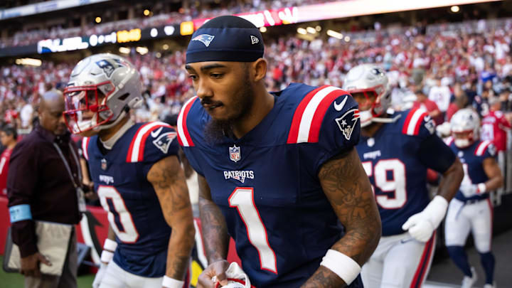 Dec 15, 2024; Glendale, Arizona, USA; New England Patriots wide receiver Ja'Lynn Polk (1) against the Arizona Cardinals at State Farm Stadium. Mandatory Credit: Mark J. Rebilas-Imagn Images Dec 15, 2024; Glendale, Arizona, USA; New England Patriots wide receiver Ja'Lynn Polk (1) against the Arizona Cardinals at State Farm Stadium. Mandatory Credit: Mark J. Rebilas-Imagn Images