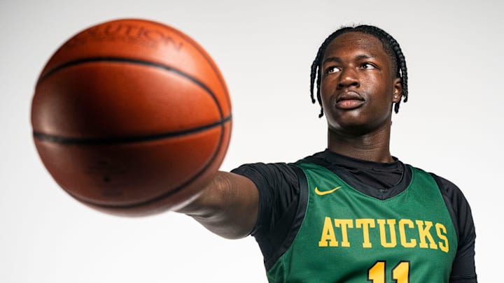 Crispus Attucks Dezmon Briscoe (11) poses for a photo Tuesday, Oct. 10, 2023, at The Indianapolis Star. Crispus Attucks Dezmon Briscoe (11) poses for a photo Tuesday, Oct. 10, 2023, at The Indianapolis Star.