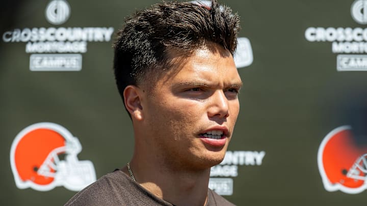 May 10, 2025; Berea, OH, USA; Cleveland Browns quarterback Dillon Gabriel (5) talks to the media during rookie minicamp at CrossCountry Mortgage Campus. Mandatory Credit: Ken Blaze-Imagn Images May 10, 2025; Berea, OH, USA; Cleveland Browns quarterback Dillon Gabriel (5) talks to the media during rookie minicamp at CrossCountry Mortgage Campus. Mandatory Credit: Ken Blaze-Imagn Images