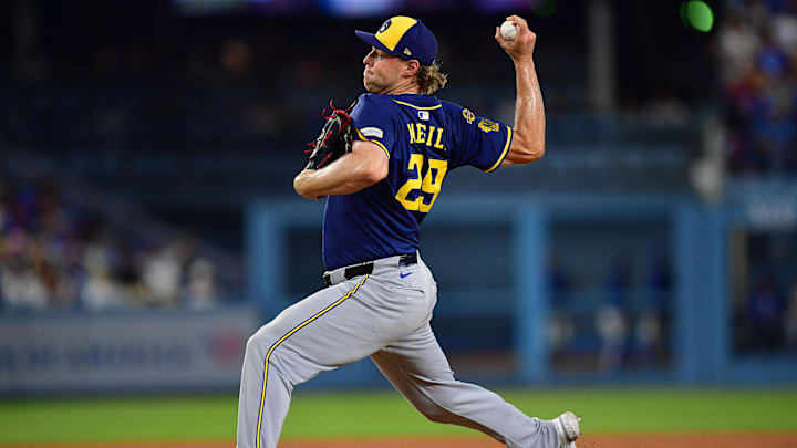 Jul 18, 2025; Los Angeles, California, USA; Milwaukee Brewers pitcher Trevor Megill (29) throws against the ;Los Angeles Dodgers during the ninth inning at Dodger Stadium. Mandatory Credit: Gary A. Vasquez-Imagn Images