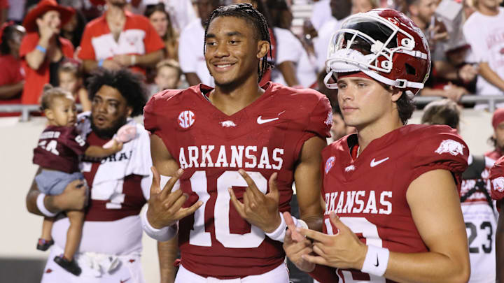 Arkansas Razorbacks quarterback Taylen Green (10) celebrates with teammates after the game against the Pine Bluff Golden Lions at War Memorial Stadium. Arkansas won 70-0. Arkansas Razorbacks quarterback Taylen Green (10) celebrates with teammates after the game against the Pine Bluff Golden Lions at War Memorial Stadium. Arkansas won 70-0.