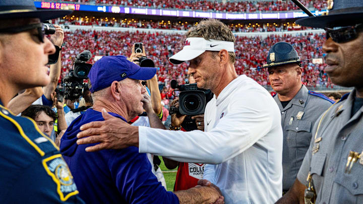 LSU head coach Brian Kelly and Ole Miss head coach Lane Kiffin shake hands after a college football game between Ole Miss and LSU at Vaught-Hemingway Stadium in Oxford, Miss. Ole Miss defeated LSU 24-19.