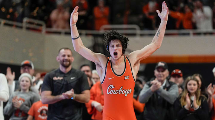 Oklahoma State's Jax Forrest celebrates after winning his match over Oklahoma's Carter Schmidt at 133 pounds during a Bedlam wrestling dual between the Oklahoma State Cowboys (OSU) and the University of Oklahoma Sooners (OU) at Gallagher-Iba in Stillwater, Okla., Sunday, Jan. 11, 2026.