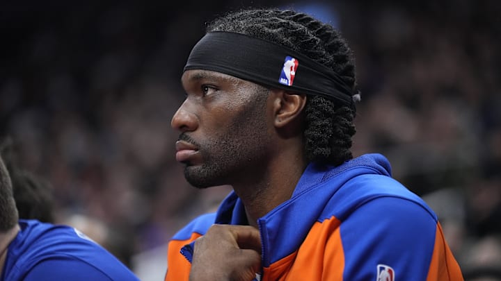 Feb 4, 2025; Toronto, Ontario, CAN; New York Knicks center Precious Achiuwa (5) watches from the bench during the first half against the Toronto Raptors at Scotiabank Arena. Mandatory Credit: John E. Sokolowski-Imagn Images Feb 4, 2025; Toronto, Ontario, CAN; New York Knicks center Precious Achiuwa (5) watches from the bench during the first half against the Toronto Raptors at Scotiabank Arena. Mandatory Credit: John E. Sokolowski-Imagn Images