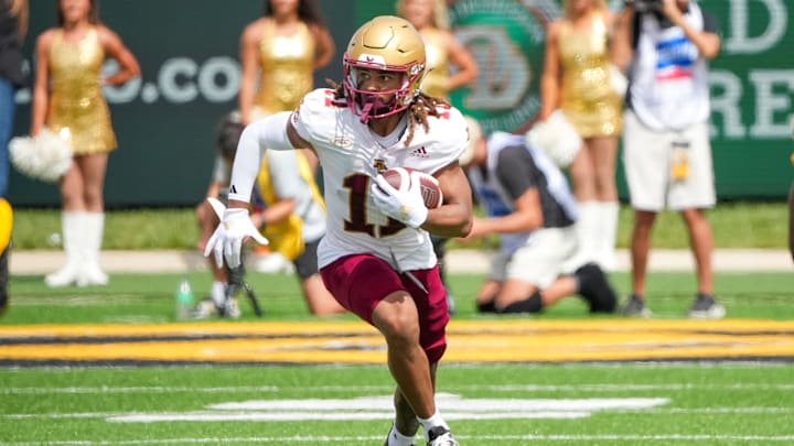 Sep 14, 2024; Columbia, Missouri, USA; Boston College Eagles wide receiver Lewis Bond (11) runs the ball against the Missouri Tigers during the first half at Faurot Field at Memorial Stadium. Mandatory Credit: Denny Medley-Imagn Images