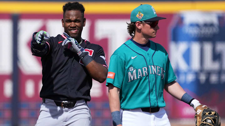 Feb 26, 2026: Cleveland Guardians center fielder Angel Martinez (1) reacts after hitting a single against the Seattle Mariners in the first inning at Peoria Sports Complex. 